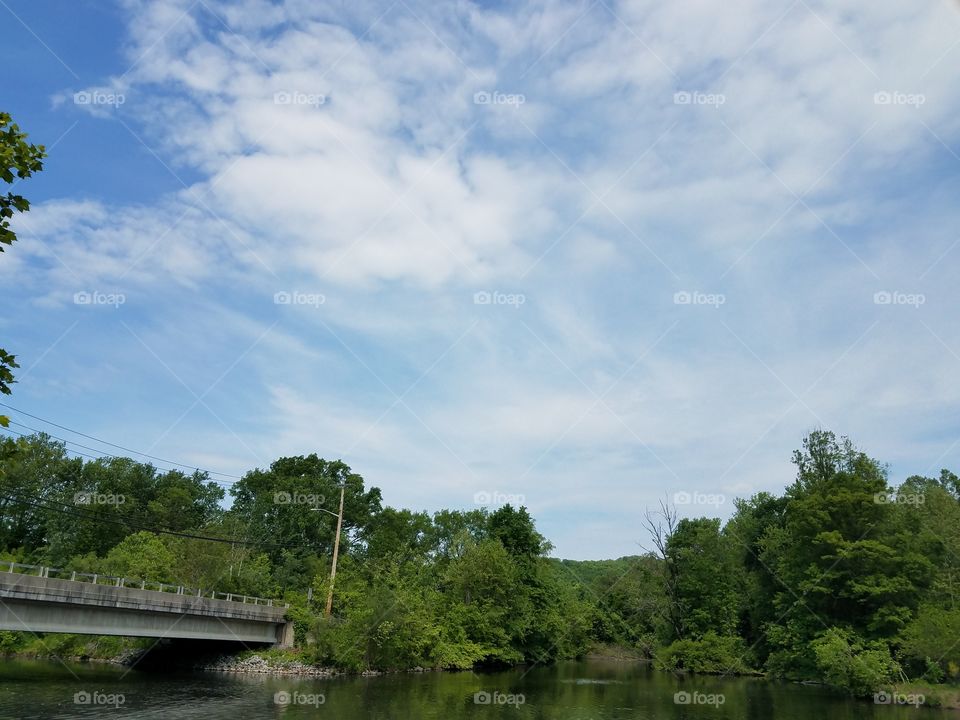 Cloudy skies on the river in NJ park