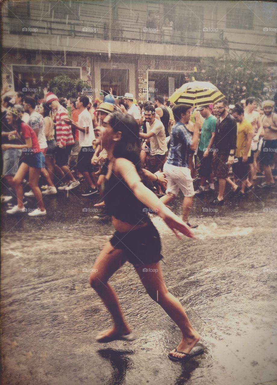 Girl dancing in the rain