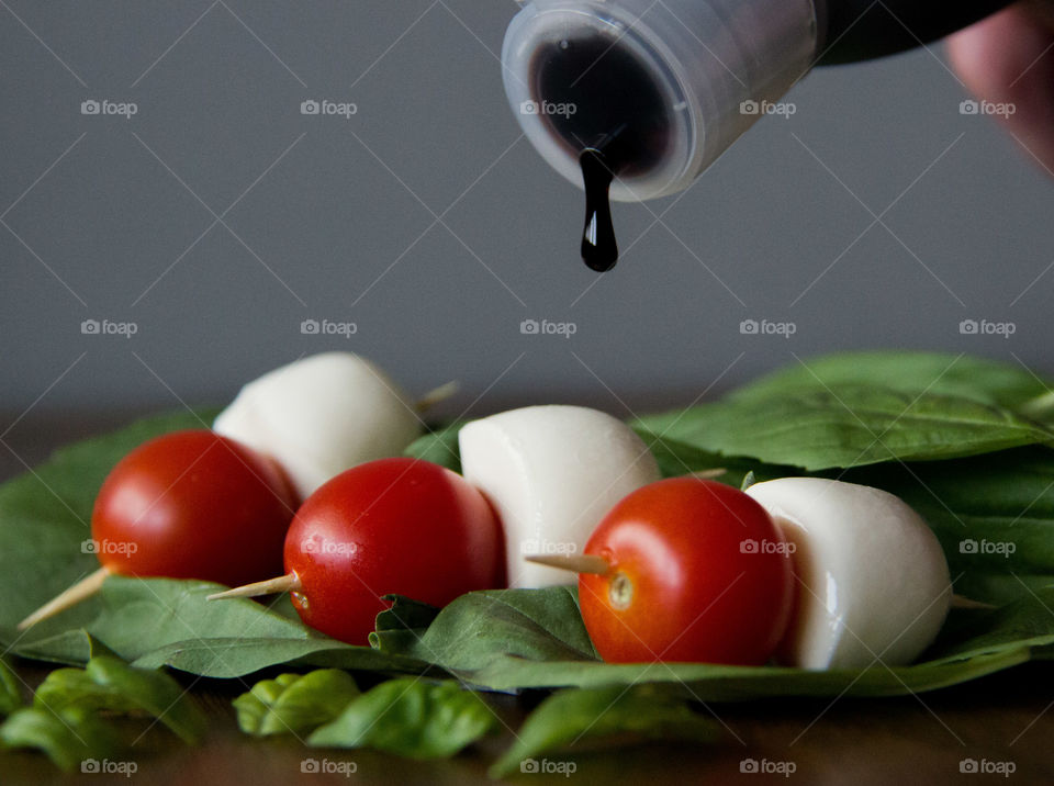 Caprese salad with balsamic vinegar drop