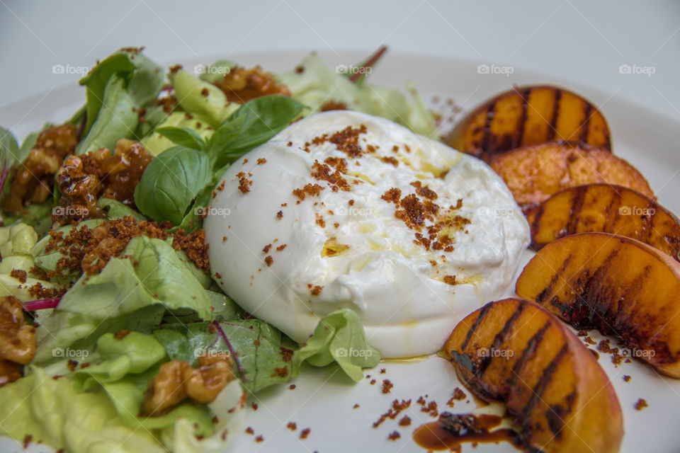 Burrata and grilled peach salad