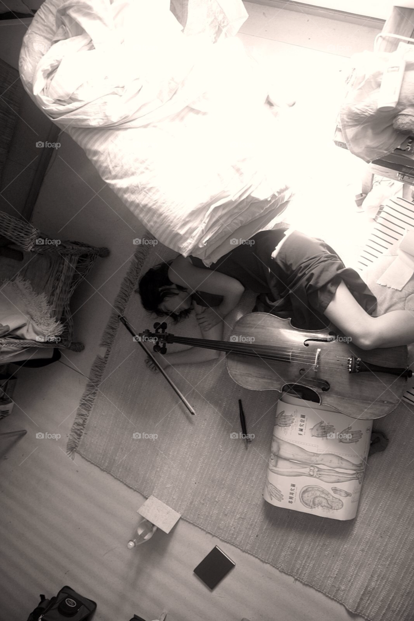 artistic tired exhausted cello player by hoslo