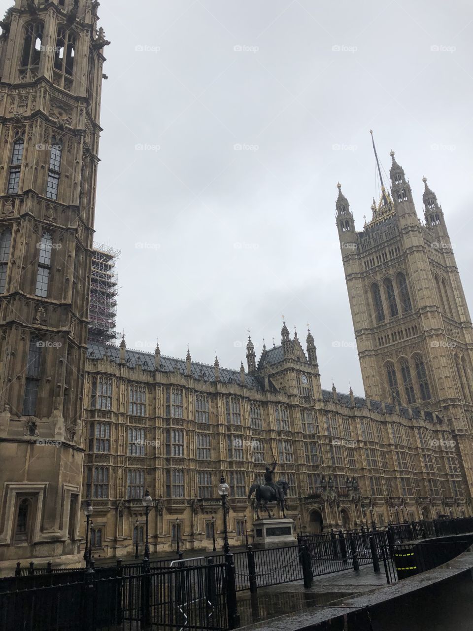 A closeup picture of Houses of Parliament in London, England on a grey April morning. 