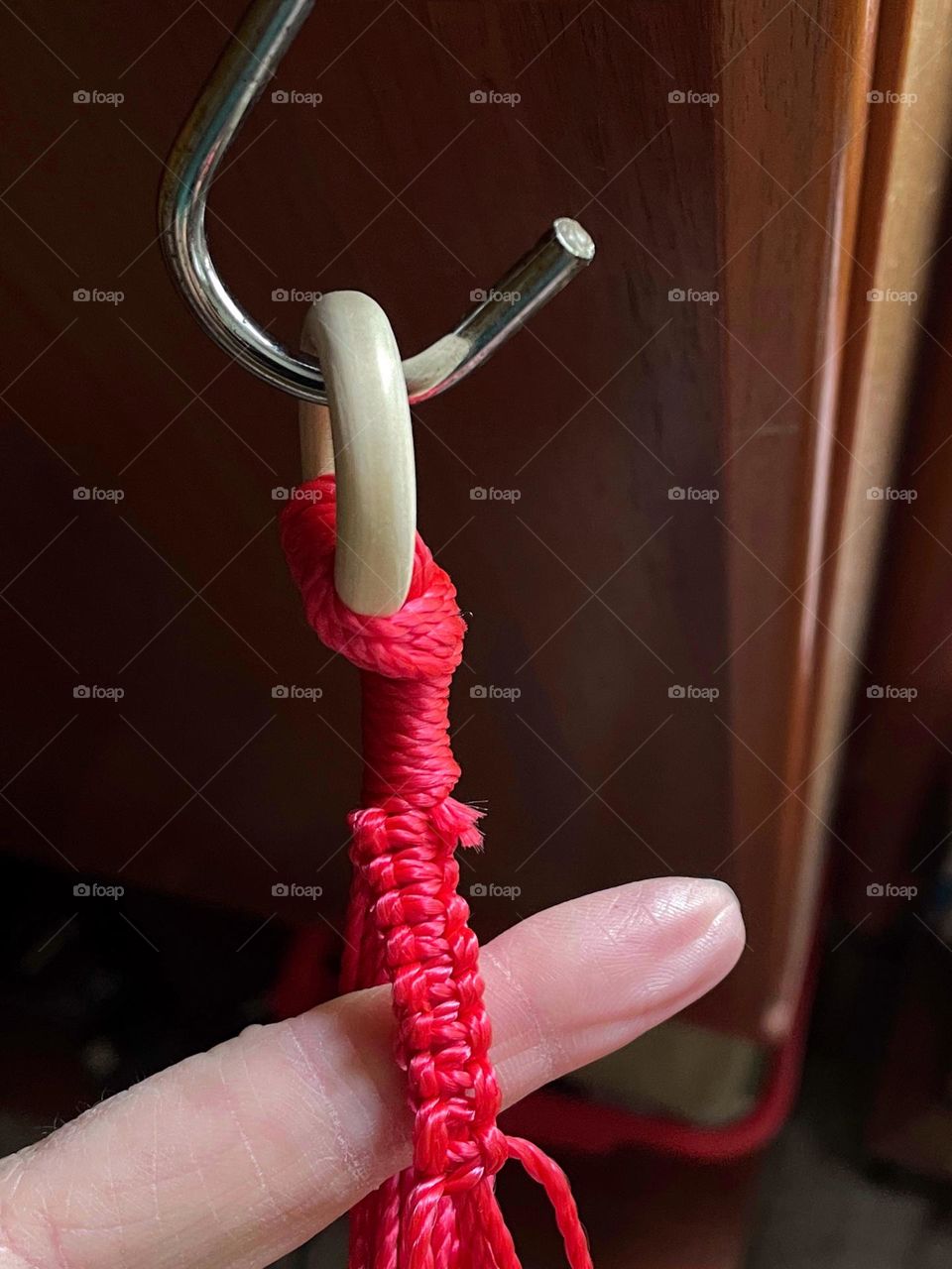 Close-up of a red macrame needlework