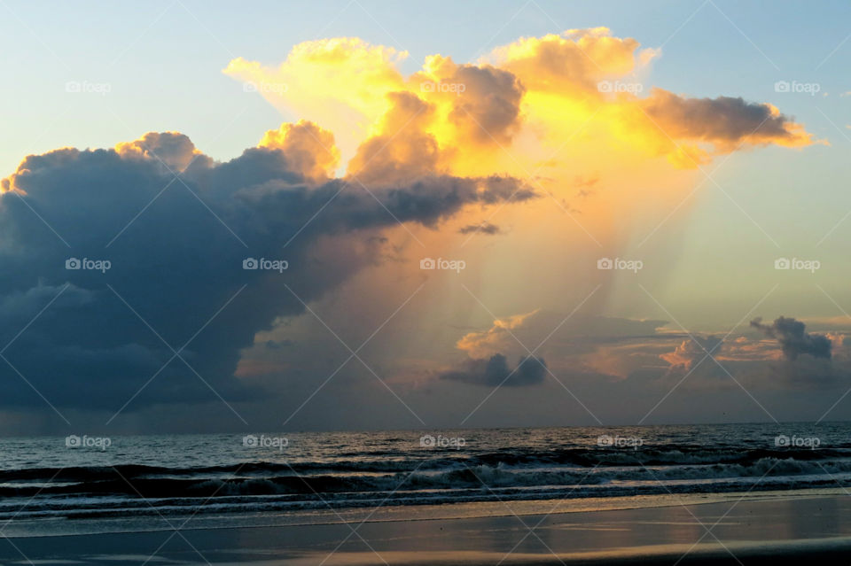 Cloudy sunrise at the beach 
