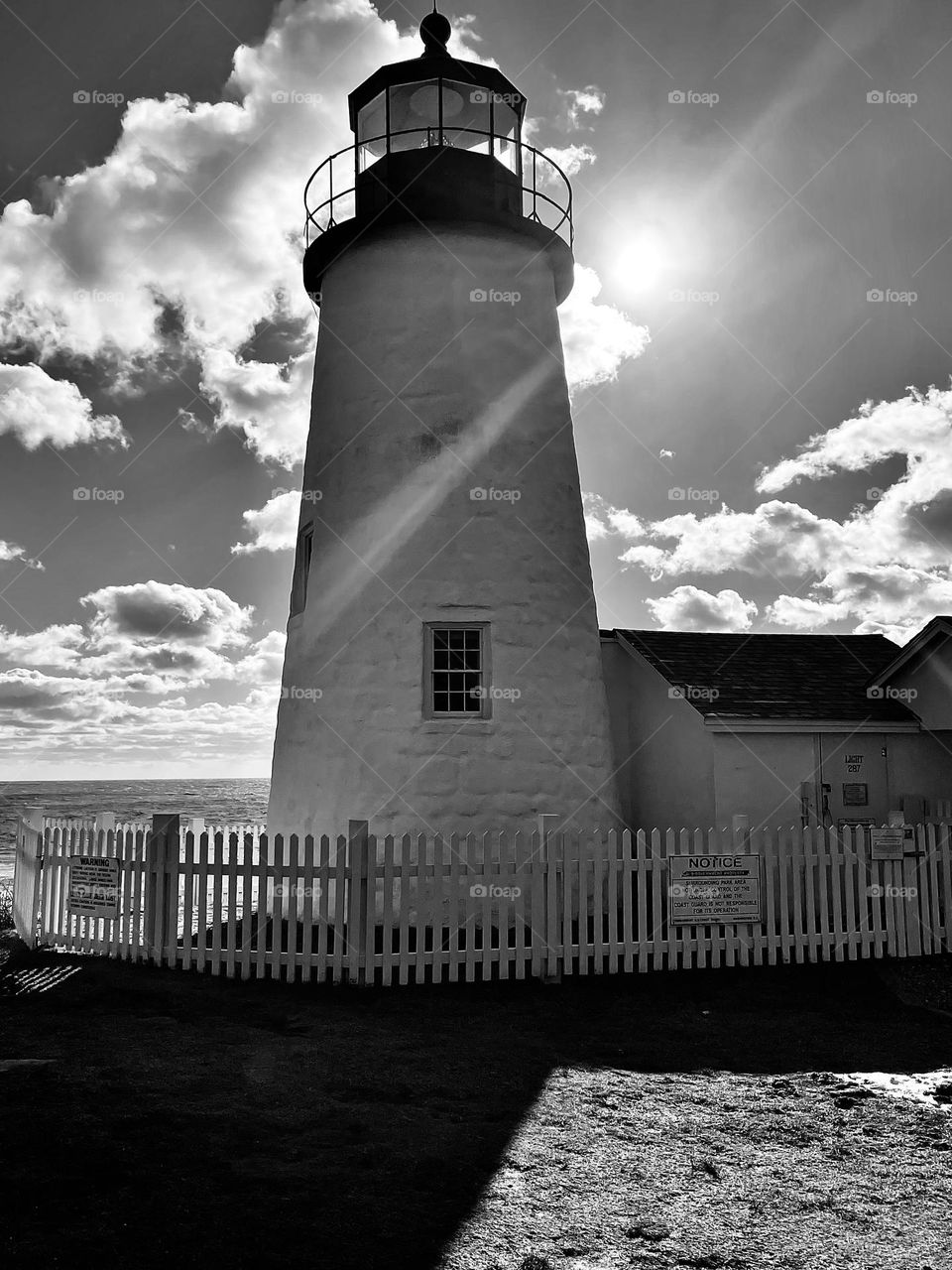 A Light for the Lighthouse - - The afternoon sun casts Pemaquid Point Lighthouse into shadow.