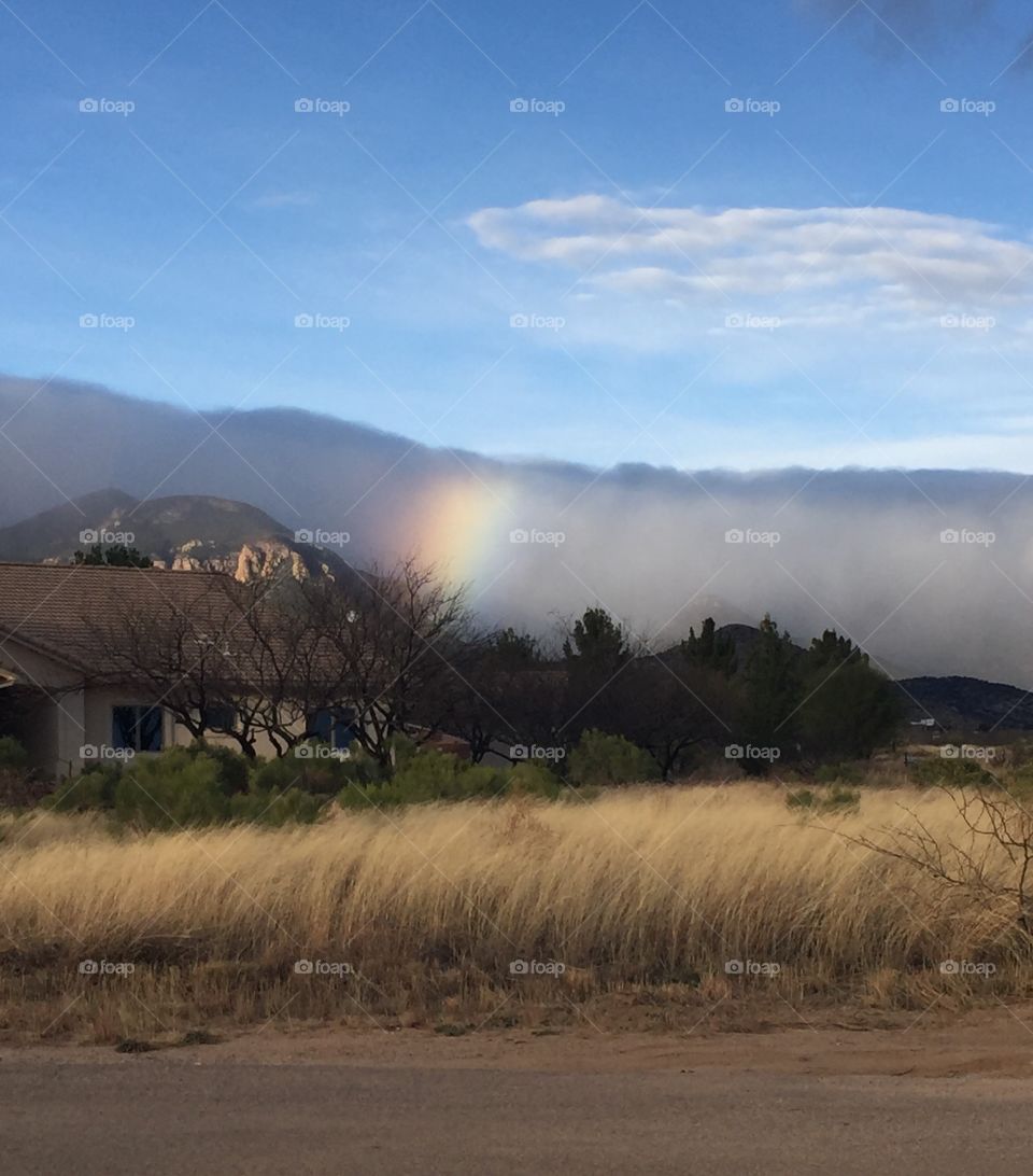 Partial rainbow, dramatic sky, Arizona 