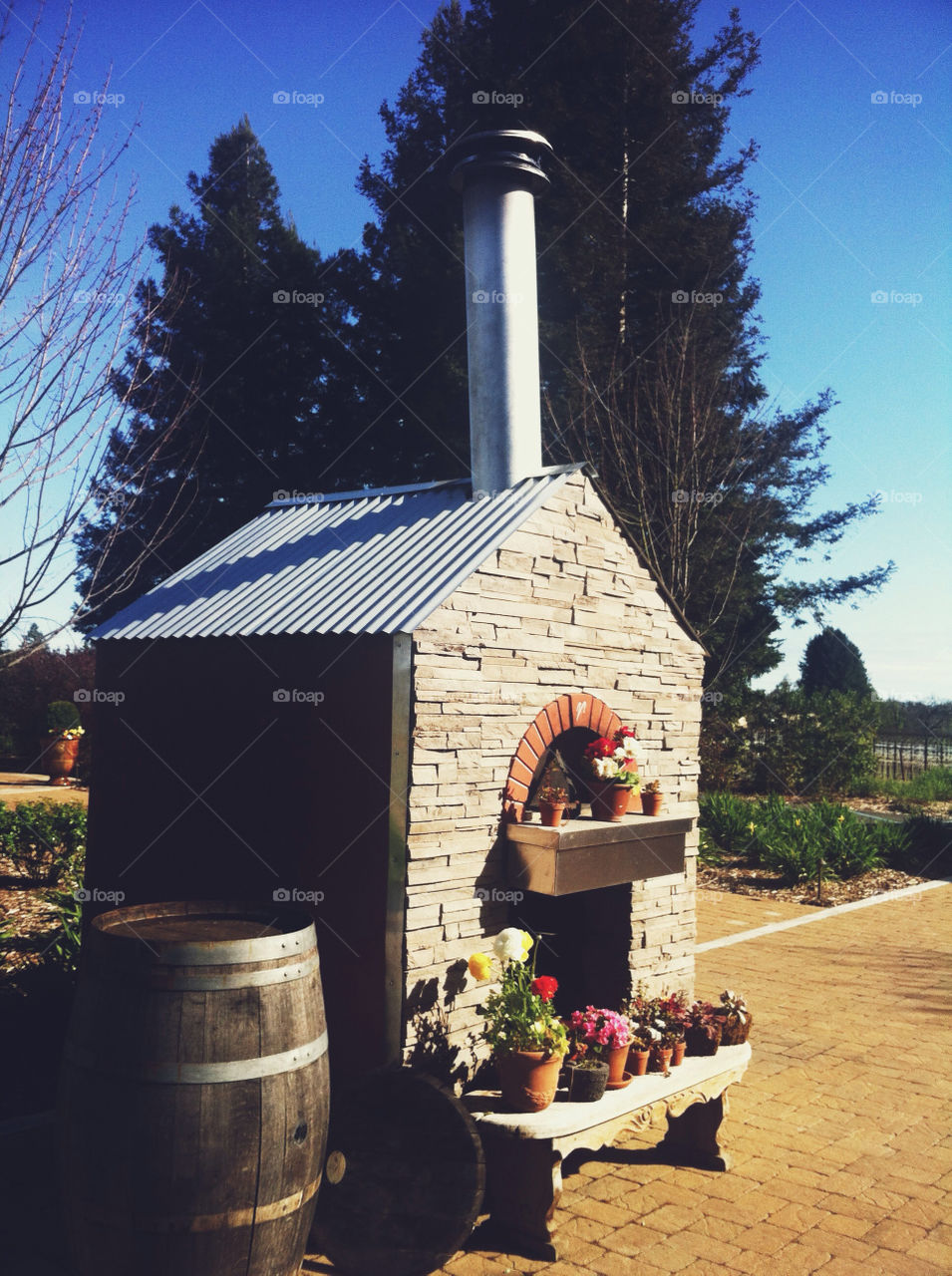 An outdoor fireplace at a winery.