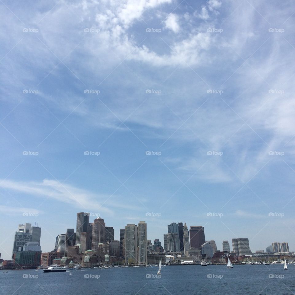 Boston skyline from a ferry. From a boat in boston harbor