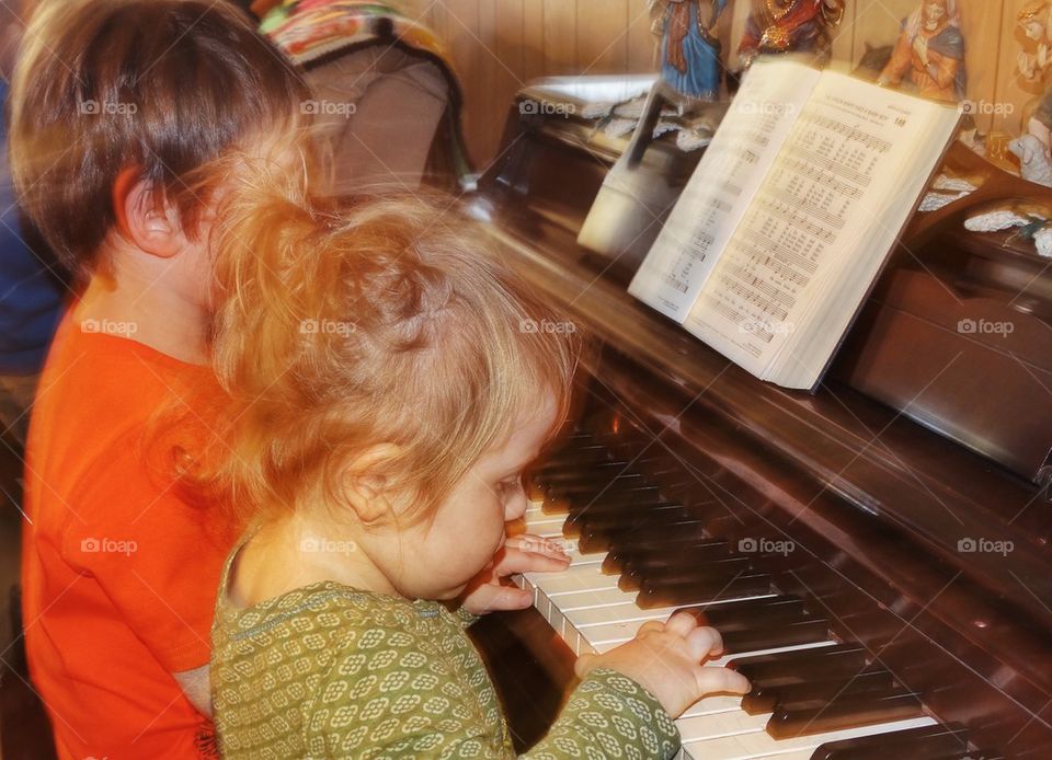 Children Playing Piano