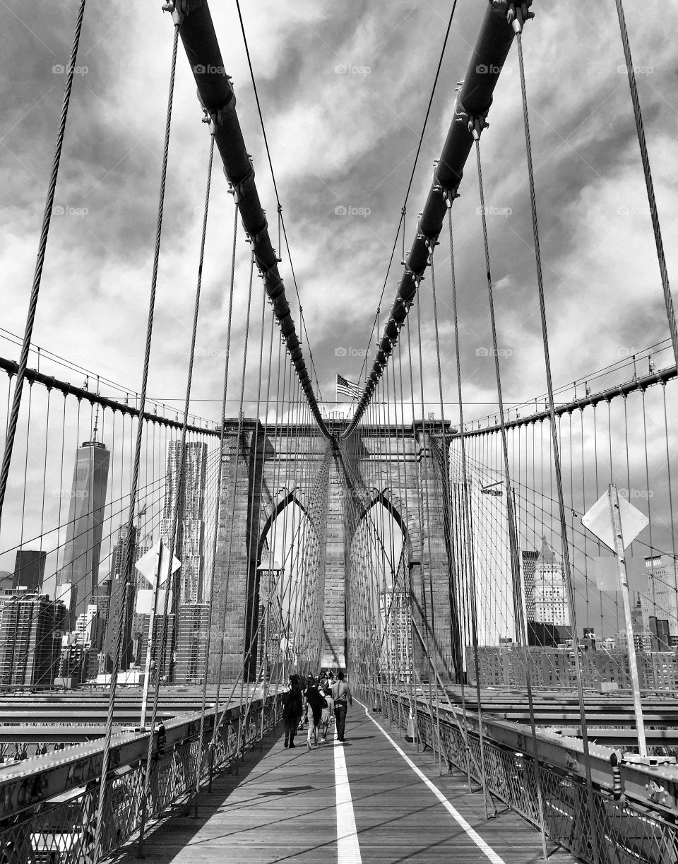 People walking on brooklyn bridge, New York