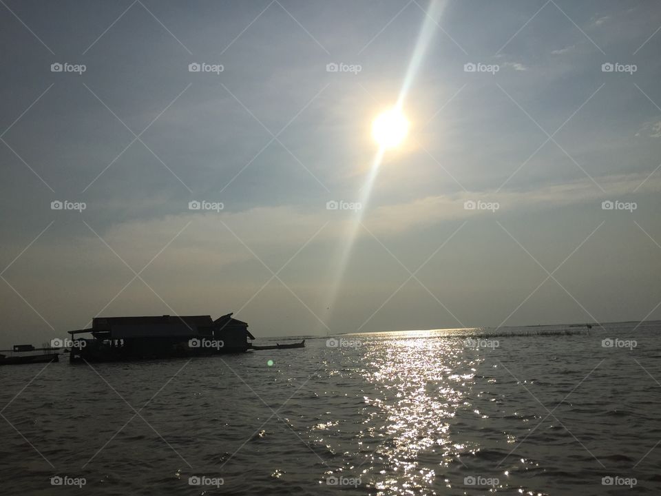 Floating Village with sun Reflection