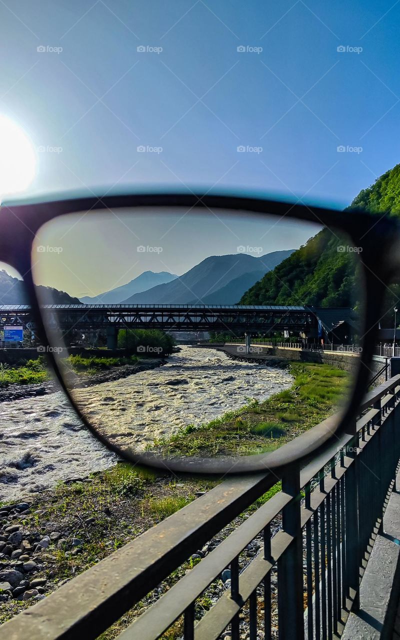 Mountain view through glasses