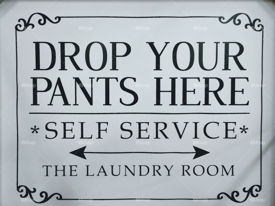 laundry pants instruction sign