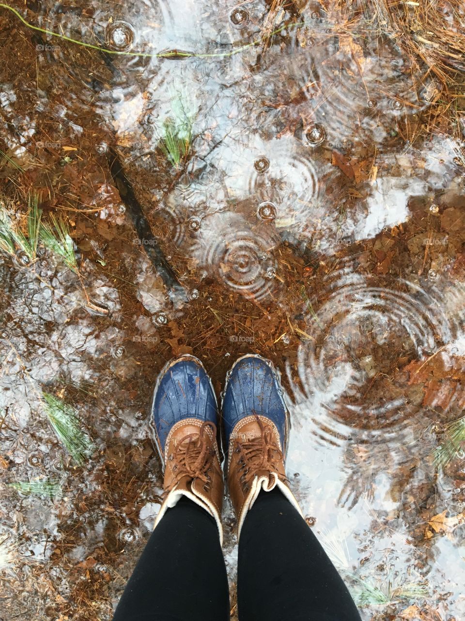 Rain boots + puddle