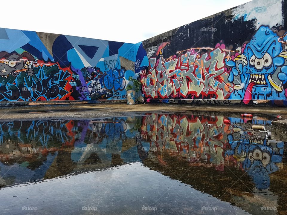 urban playground, colorful vivid street art graffiti reflection