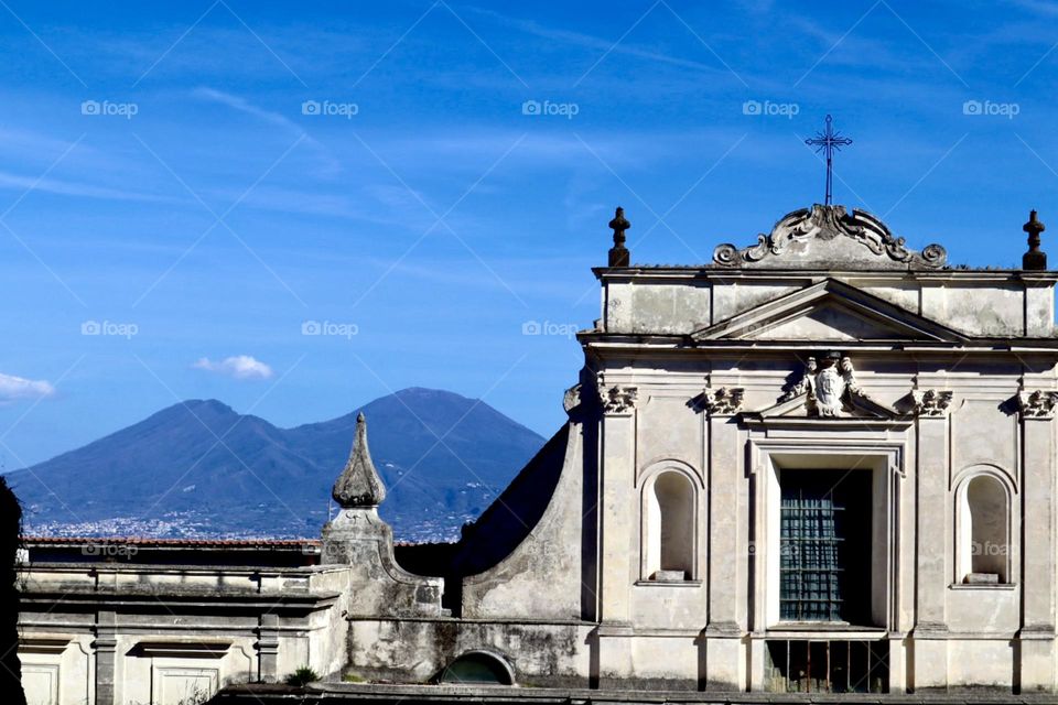 Church in Napoli with Volcano Vezuvio on the background 