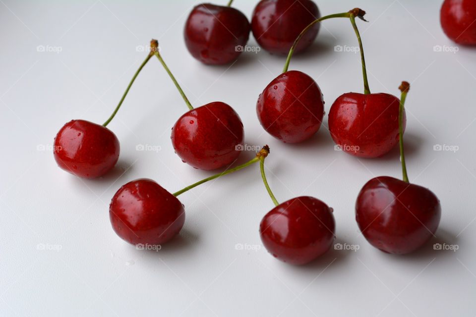 red cherry tasty summer food white background