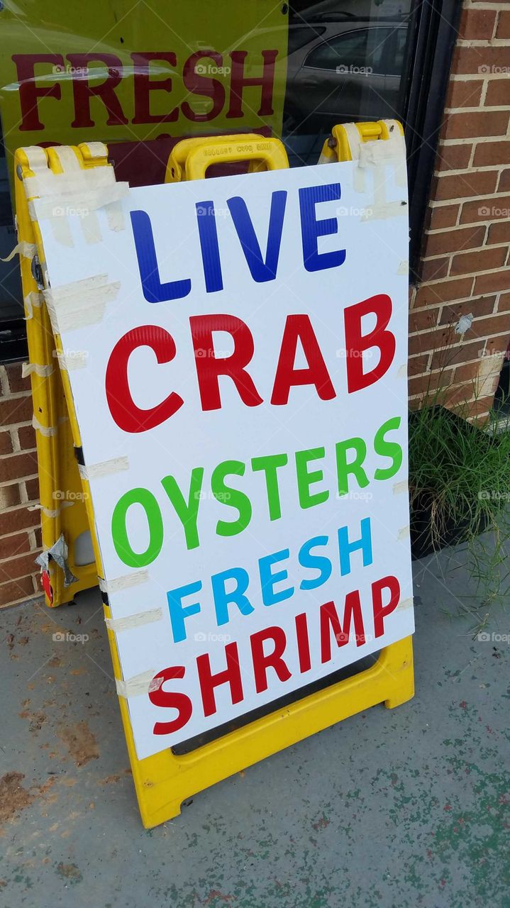 live Crav oysters fresh shrimp sign