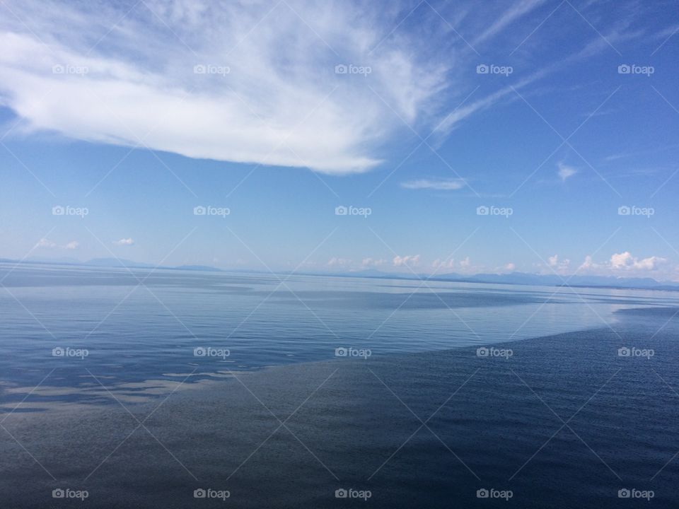 Whispery clouds. Beautiful calm seas with whispery clouds 