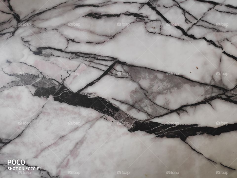 A Black and white marble stone