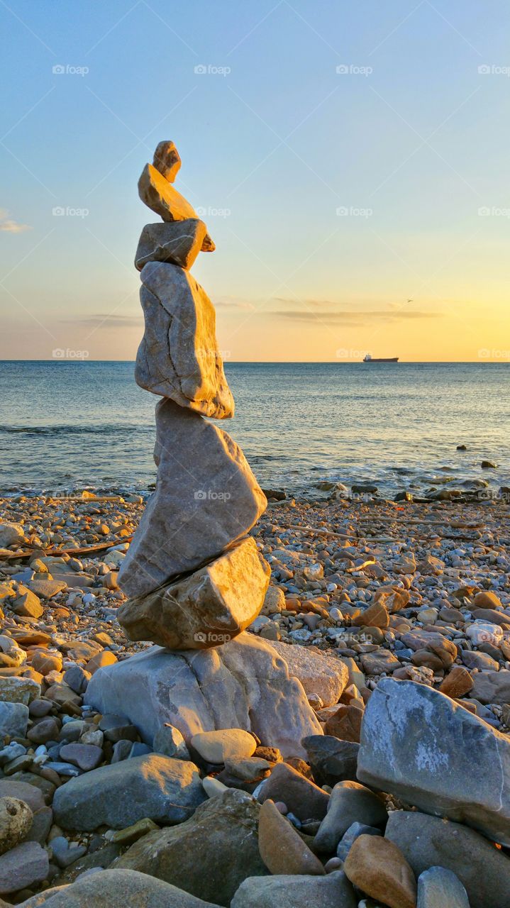 Zen stone tower at the beach