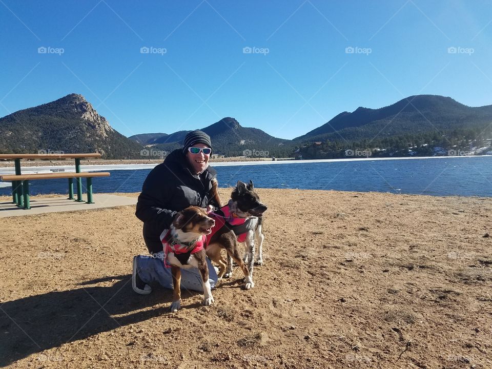 just a man and his dogs in the Rocky Mountains