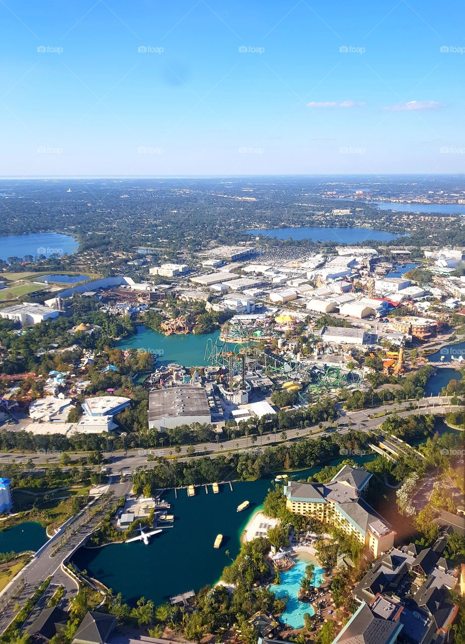 Orlando from helicopter pov. views of universal studios and flat as far as the eye can see
