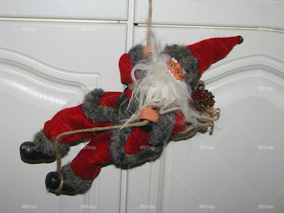 Christmas decoration. Santa on a rope. 