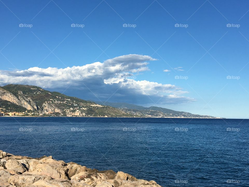 Seashore near Menton with view on Italian coastline 