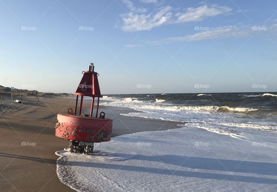 Hurrican Aftermath - buoy on the beach 