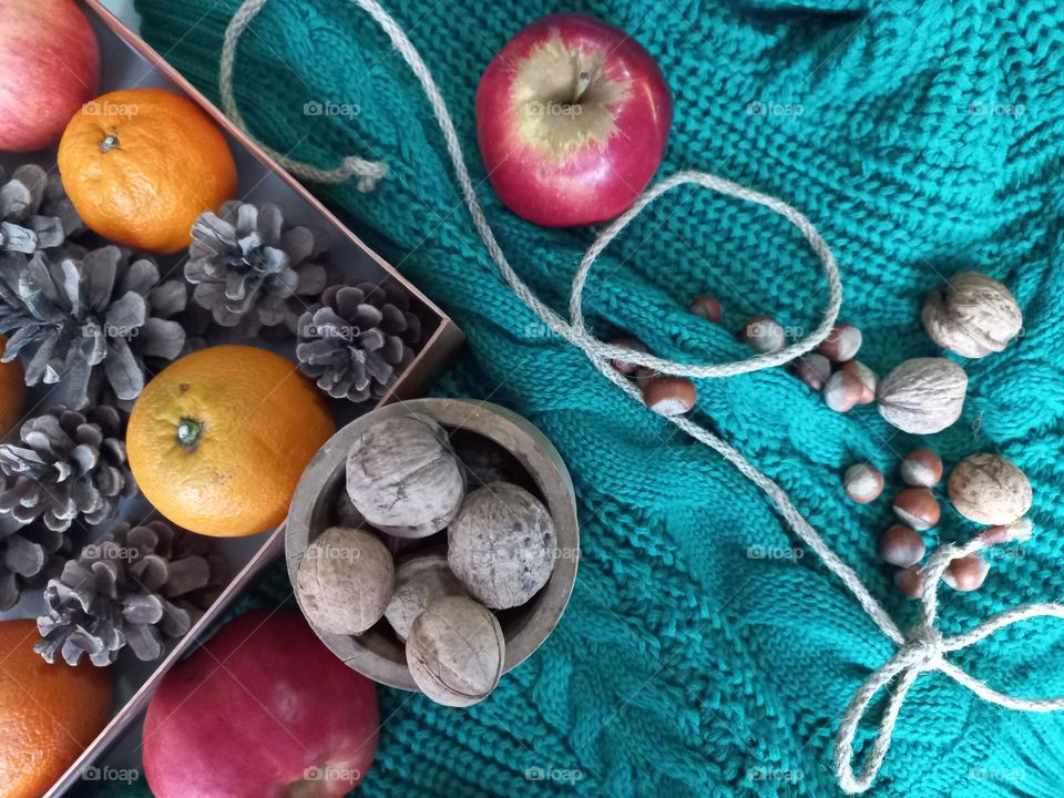 nuts and fruits in a box.