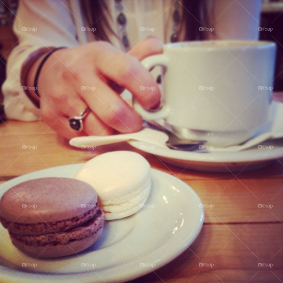 Enjoying gourmet hot chocolate and macarons from L.A Burdick with a