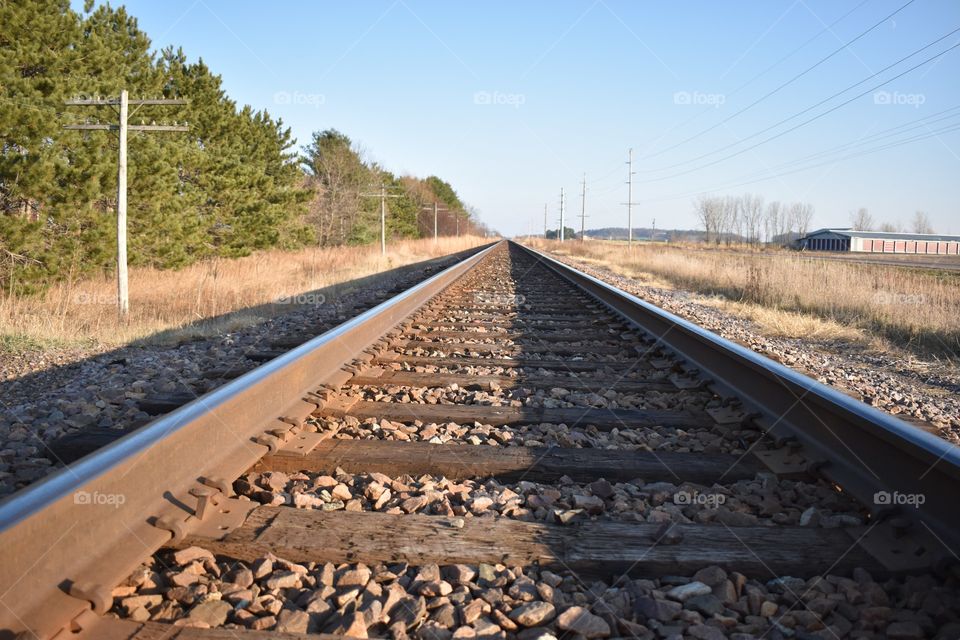 Railroad tracks in the afternoon sun