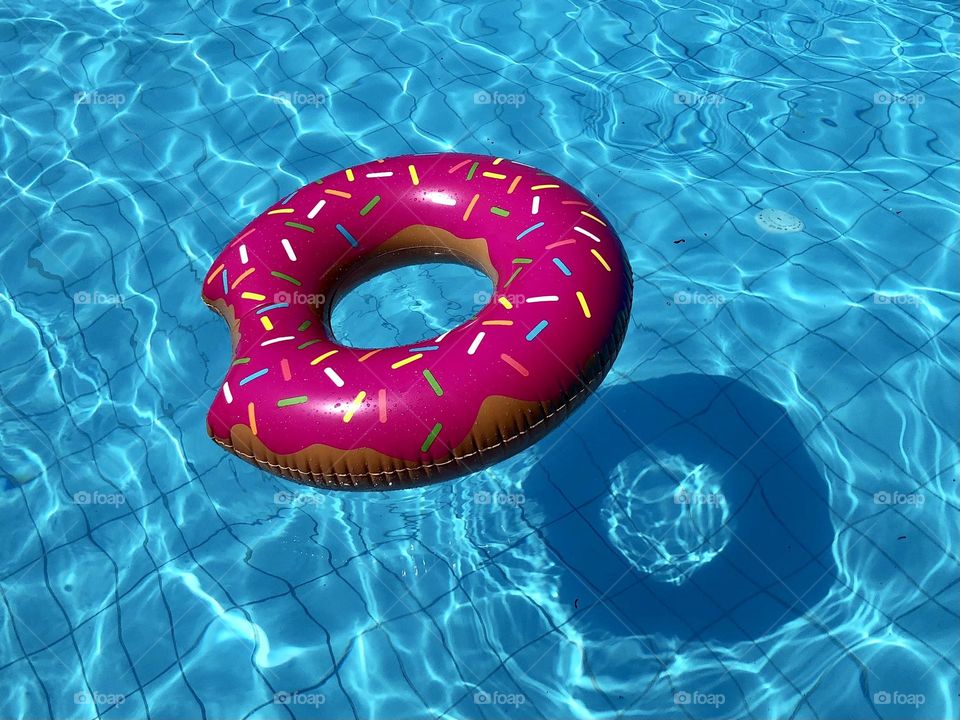 Inflatable ring float in the pool