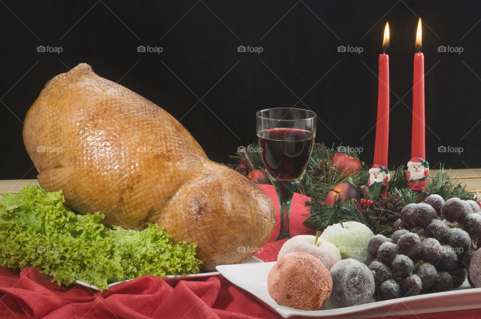 Christmas turkey grapes glass of wine and sugared apples