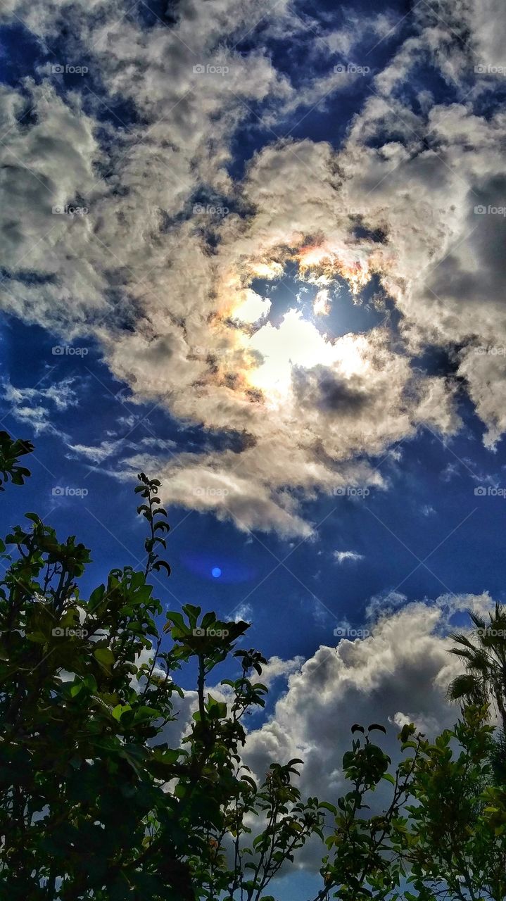 Majestic Storm Clouds. Bright summer day with beautiful majestic clouds after thunder, lightning & rain.