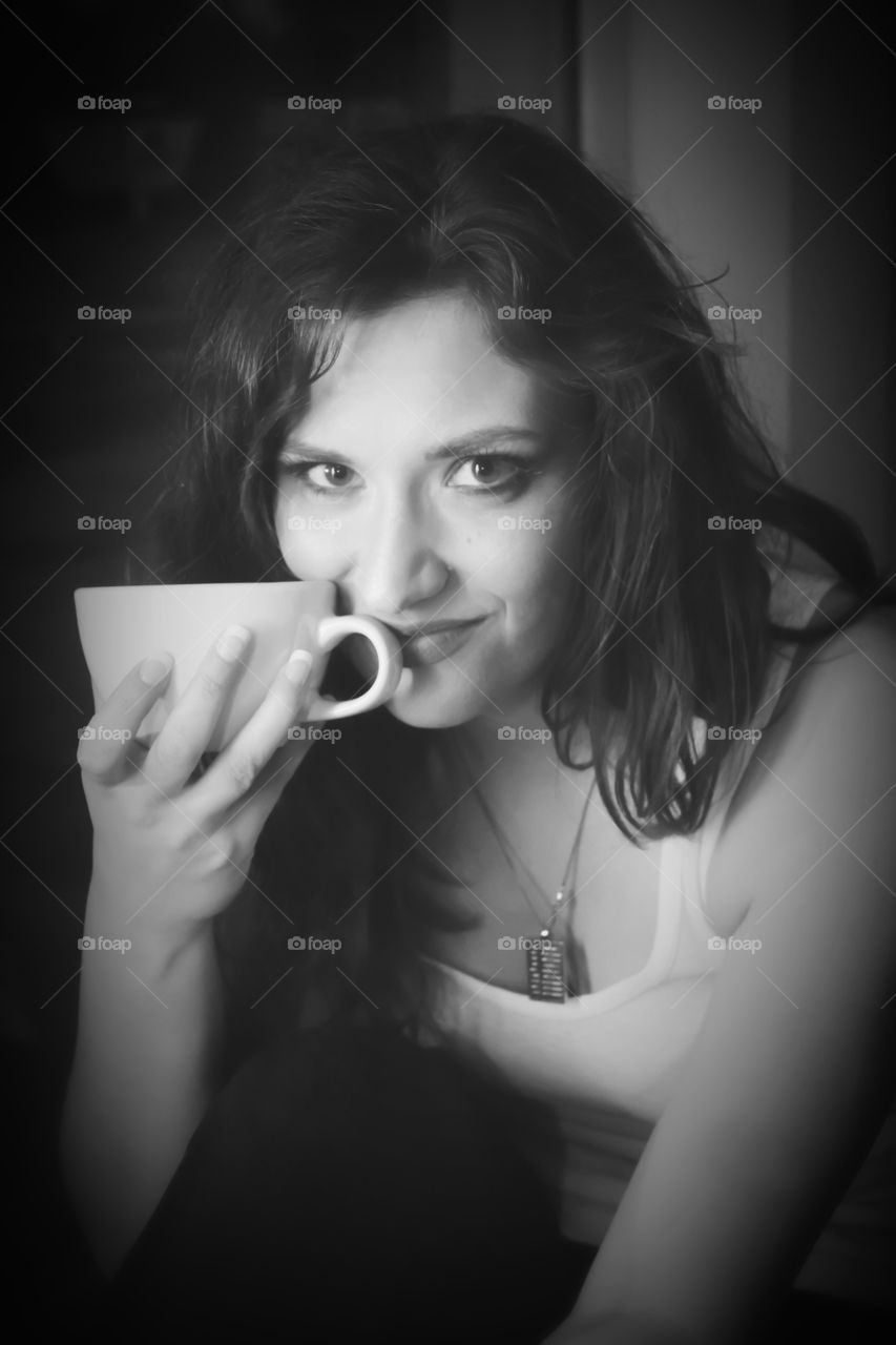 Beautiful woman and her coffee mug 