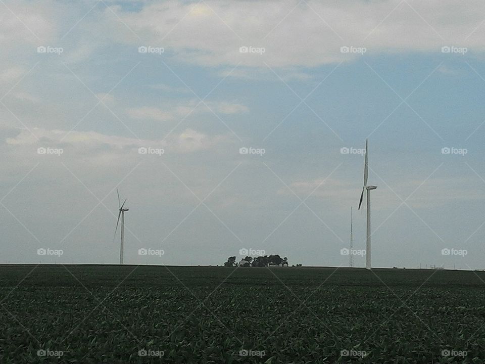 wind farm on the farm. wind mills on a family farm