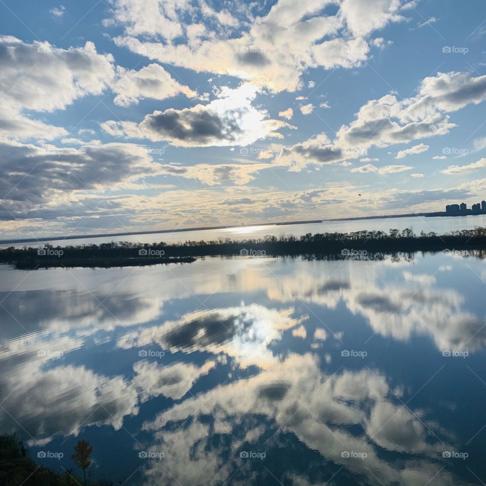 Mirror effect on St.Lawrence river, Quebec, Canada 
