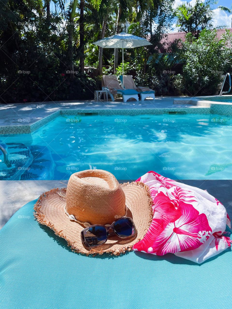 Hat sunglasses and sarong 