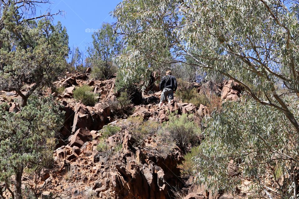 Male hiker on top of gorge wall in South Australia outback 