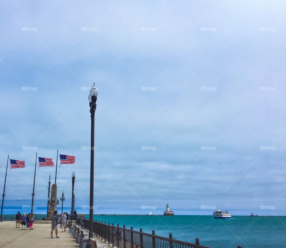 Beautiful lakeside view of Navy Pier & Lake Michigan on a cloudy day. 