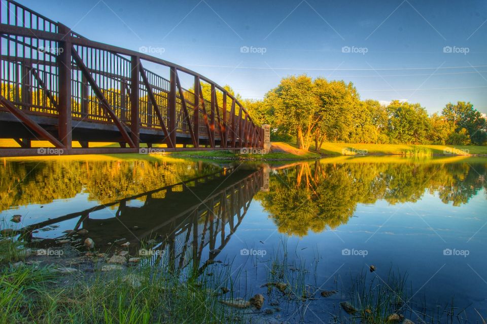 Reflection of bridge in lake