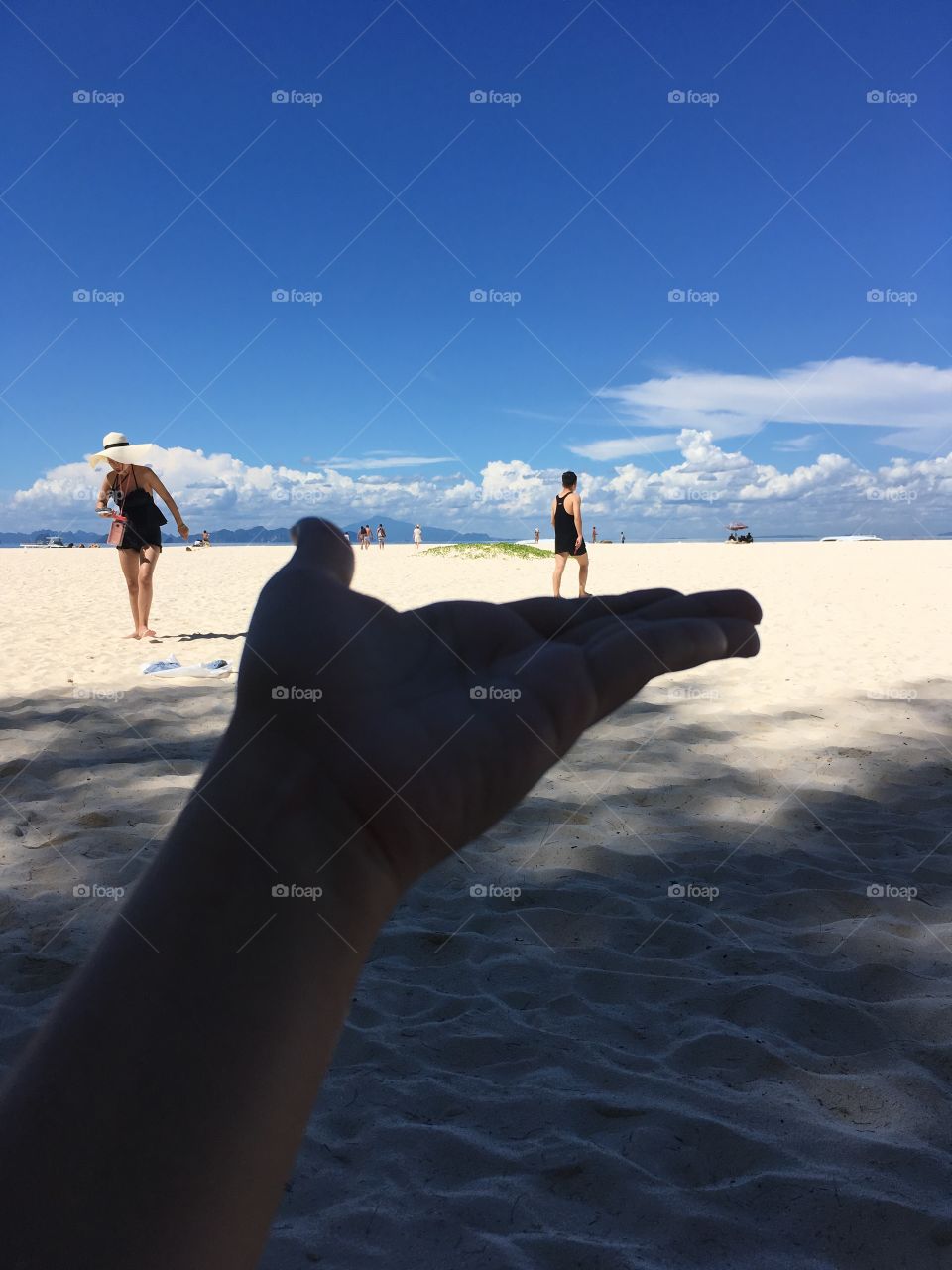 A little perspective fun on white sand beach