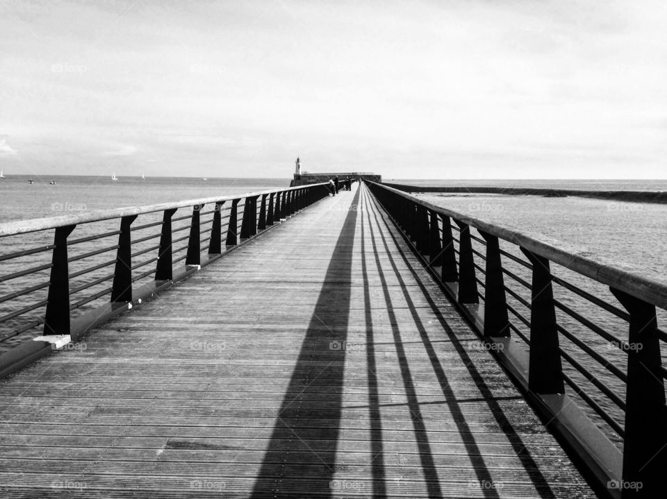 wooden pier overlooking the horizon