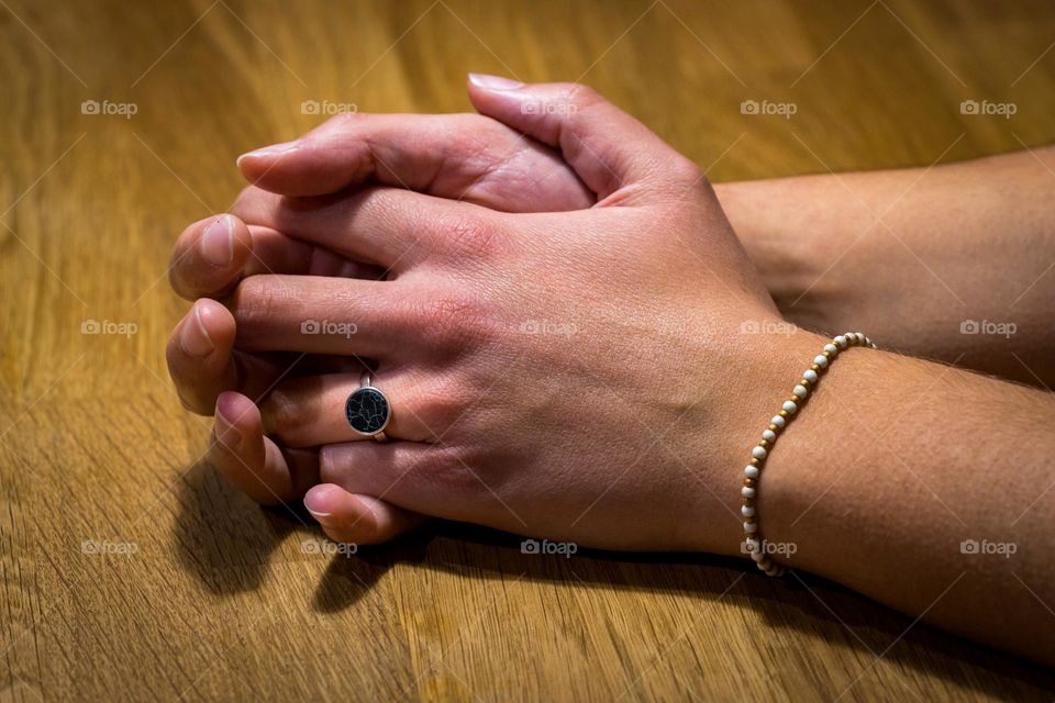 Ring and bracelet in a woman hand