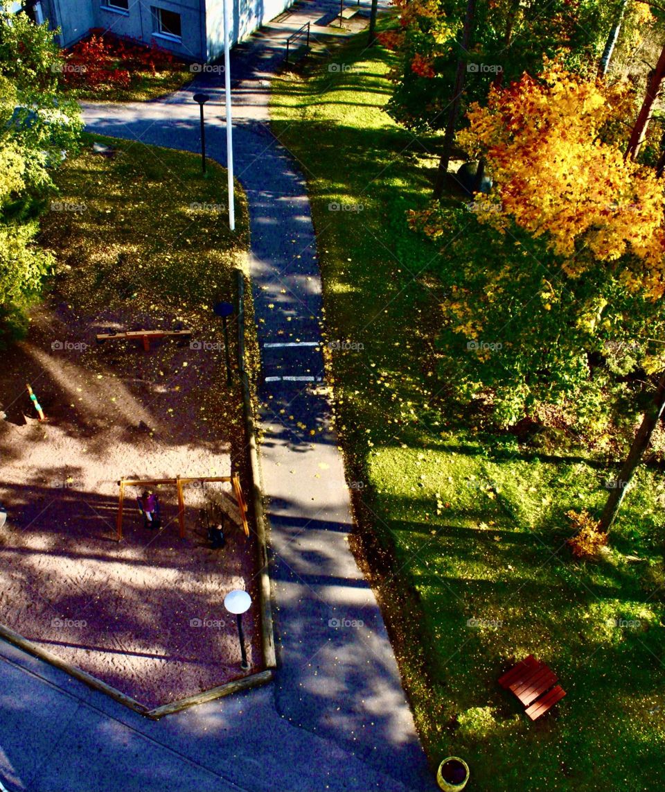 Childern palying in tne playground, view from 7:th floor