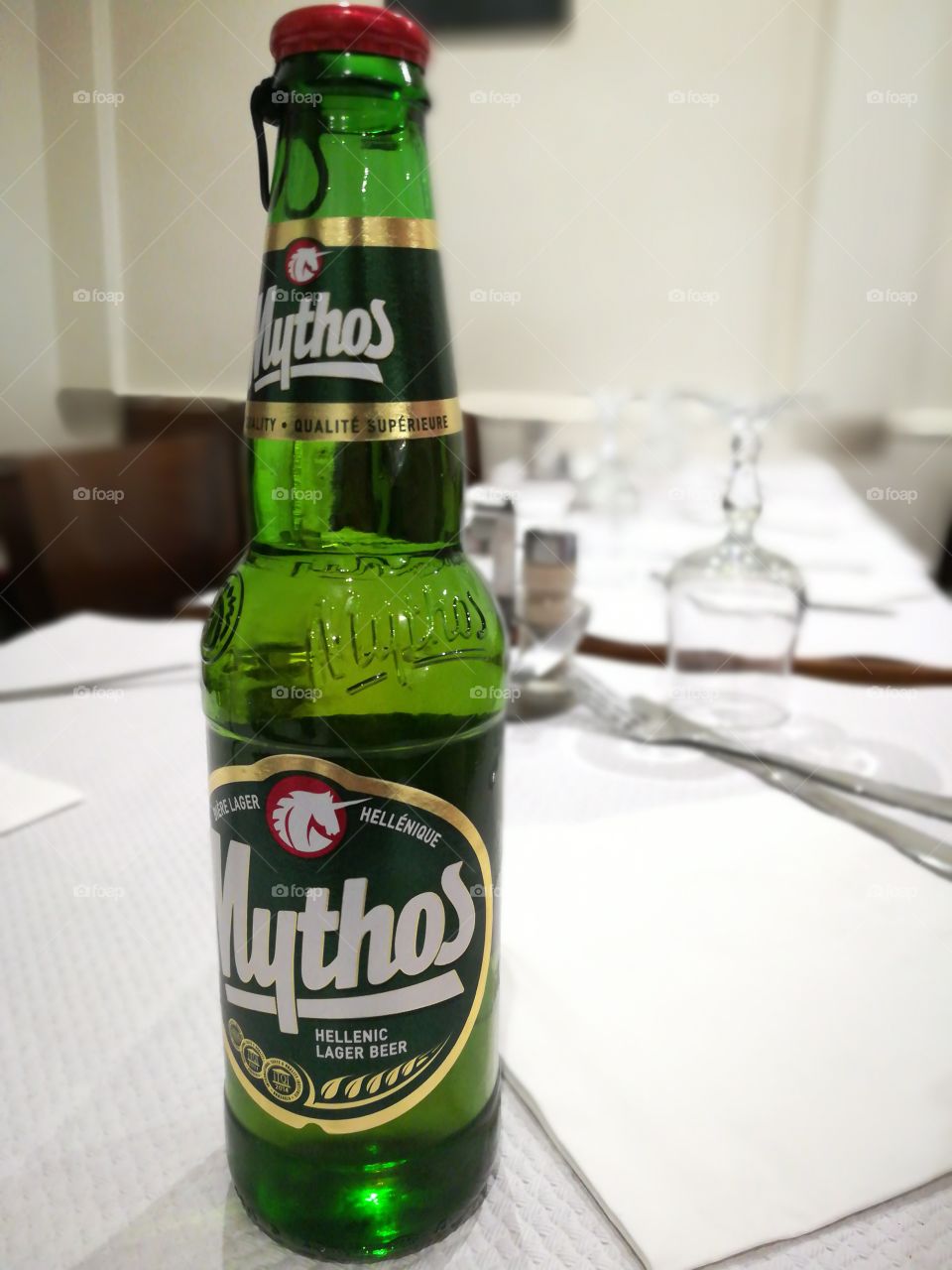It's not Heineken, but a greek beer named Mythos.
