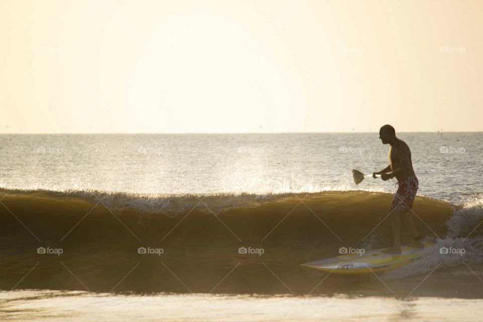 Paddle Boarding in the Surf