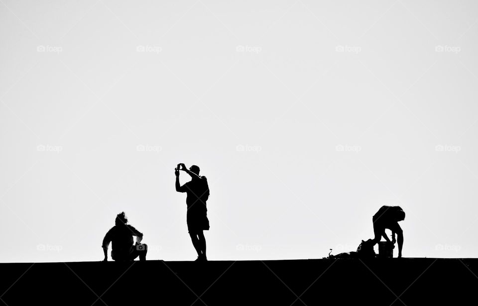 Black and white photo of silhouettes